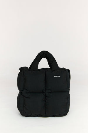 Black puffer backpack with 'Aekyung' branding on a white background